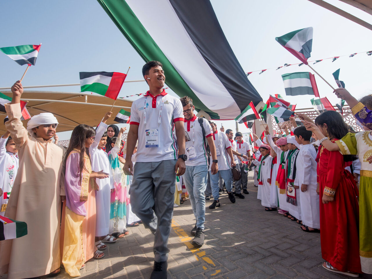 Students from ACTVET and ADEC schools in Abu Dhabi welcome competitors as part of the One School One Country programme at WorldSkills Abu Dhabi 2017.